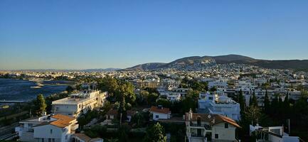 the ocean and city in the mountains photo