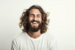 AI generated A Man with curly hair and beard, smiles against a white background photo