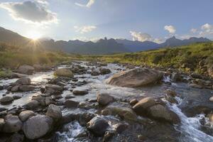 Sunset at the mountain stream photo