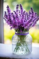 AI generated Close up of lavender in glass jar on small table against neutral wall background photo