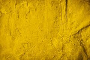 Fondo de textura de muro de hormigón amarillo foto