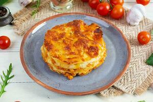 Classic lasagna with minced chiken bolognese sauce and bechamel sauce photo