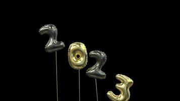 colored new year mylar balloon writing 2023 with the 3 flying away and 4 floating up to form 2024 video