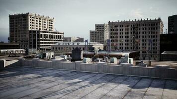 high vantage point, showing the rooftops of towering buildings at twilight photo