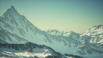 Snow covered beautiful mountain peaks photo