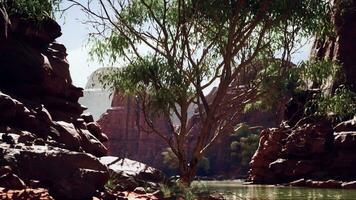 beautiful day on the river with sandstone cliffs and reflections photo