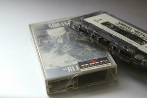 Bangkok, Thailand - 09 February 2022  90's cassette tape of Nirvana Bleach album on gray background. photo