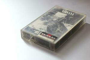 Bangkok, Thailand - 09 February 2022  90's cassette tape of Nirvana Bleach album on gray background. photo