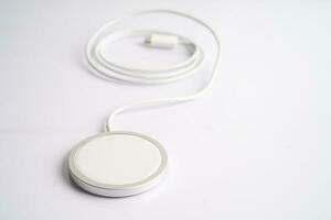 Wireless charger, magnetic charging modern equipment of mobile phone. photo