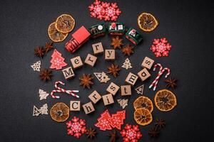 Beautiful Christmas composition with copy space with an inscription in wooden cubes photo