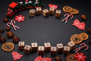 Beautiful Christmas composition with copy space with an inscription in wooden cubes photo