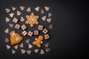 Beautiful Christmas composition with copy space with an inscription in wooden cubes photo