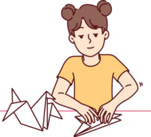 Little girl makes origami bird by folding paper animals and developing own creativity png