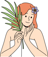 Woman with sprig of medicinal plant used for cosmetic purposes, stands in bath towel png