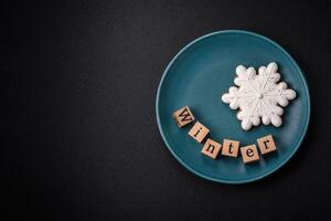 Beautiful Christmas composition with copy space with an inscription in wooden cubes photo