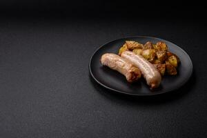 Delicious grilled chicken or pork sausages with salt, spices and herbs photo