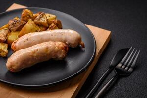 Delicious grilled chicken or pork sausages with salt, spices and herbs photo
