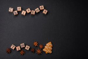 Beautiful Christmas composition with copy space with an inscription in wooden cubes photo
