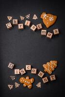 Beautiful Christmas composition with copy space with an inscription in wooden cubes photo