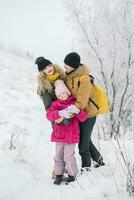 happy family detained in each other's arms photo