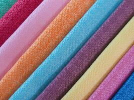 Colorful background, A stack of colorful fabric. Full frame shot of muti colored fabric background photo