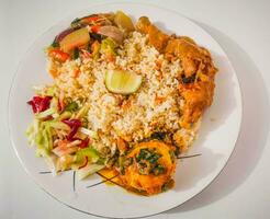 rice pilaf with chicken and vegetables, aromatic rice, chicken and a variety of flavorful vegetables photo
