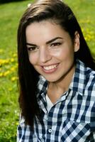 portrait of a beautiful girl on sunny meadow photo