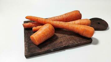 Carrots on a plate for cooking are healthy and carrots contain vitamin A photo