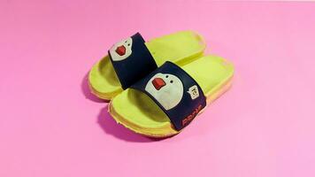 Cute yellow children's sandals photo