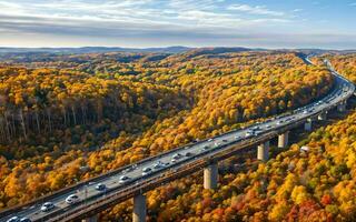 ai generado otoñal autopista puntos de vista aéreo serenidad terminado bosque y pasos elevados ai generado foto