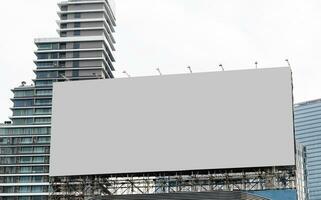 Mock up billboard on rooftop building .clipping path for mockup photo