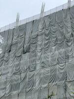construction of a building with a scaffolding photo