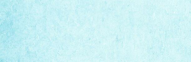 Modern turquoise limestone texture in blue light seam home wall paper concept for flat Christmas wide background, Back concrete table top floor, wall paper granite pattern, grunge seamless surface photo