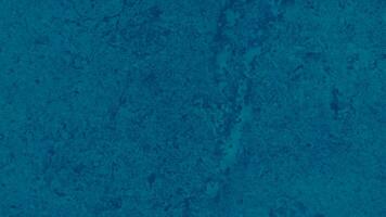 resumen azul granulado mármol Roca textura utilizar para antecedentes. rústico Armada Roca o rock con hermosa mineral venas impreso Roca textura en interior loseta antecedentes. foto