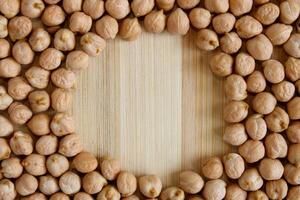 Chickpeas Seeds on Wood Surface photo