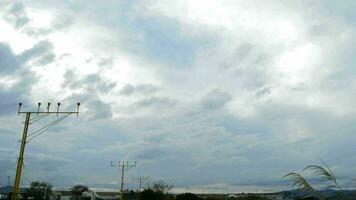 Airplane passing and landing a cloudy day video