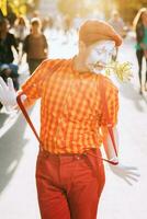 Mime on the street waiting to meet with his lover photo