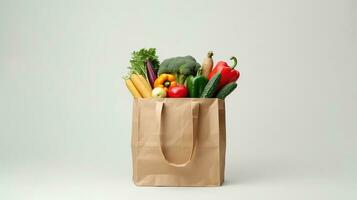 ai generado papel bolso lleno por vegetales y frutas aislado en el blanco antecedentes foto