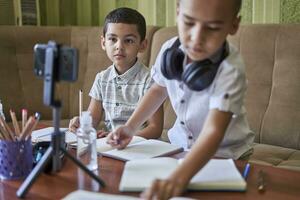 Boys studying together photo