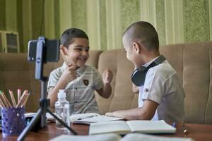 Boys studying together photo