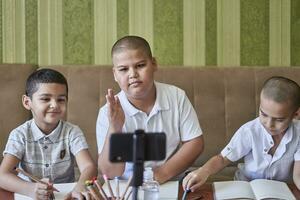 Boys studying together photo