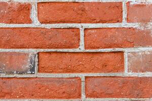 texture masonry made of red old brick photo