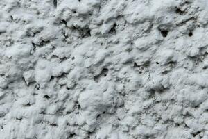 texture of the cement lining on the wall of the house photo