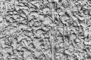 texture of the cement lining on the wall of the house photo
