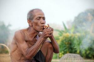 Older people are smoking. photo