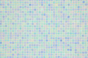 a blue and white mosaic tile wall with squares photo