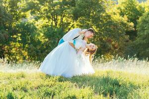 the bride and groom are photographed on the nature photo