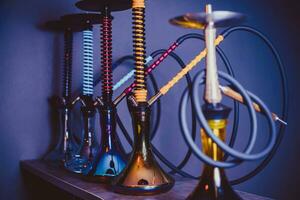 hookahs are on the table in the nightclub photo