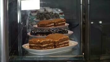 Close up of chocolate cake in a pastry shop. Selective focus. photo