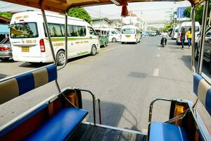 a view from the inside of a tuk tuk photo